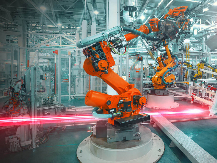 Automation robots on manufacturing shop floor with EPLAN red flash